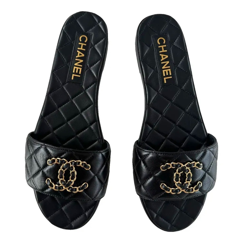 CHANEL Black Quilted Sandals with Gold Logo